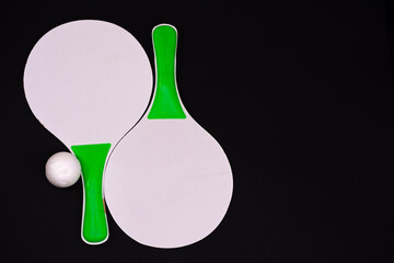 Close up of beach tennis rackets with space for writing. Isolated on background
