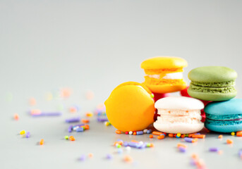 Image select focus close up macaron dessert is a sweet food or bakery, cake, biscuit, sprinkled with small toffee grades of various colors with copy space for text.
