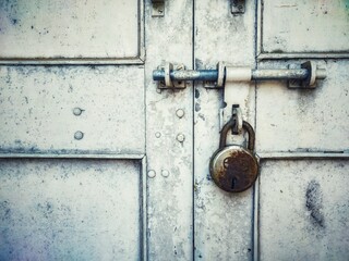 An old rusted lock captured with mobile camera