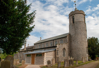 Fototapeta premium The round tower of St Marys Church in Long Stratton, Norfolk, UK