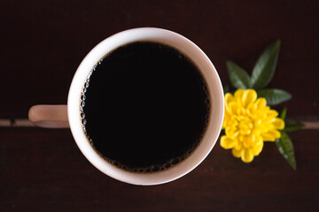 cup of coffee with flower