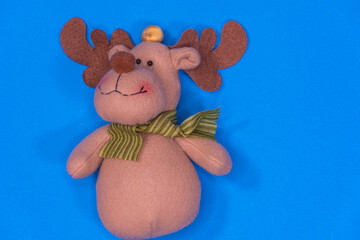 Cloth snowman isolated on colored background with space for writing