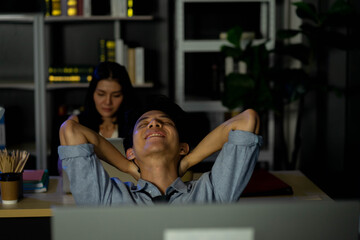 business man working overtime in late night in the office new normal