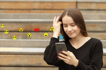 teenager girl using smartphone sending emojis, watching video live streamings