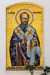 Mosaic in the form of an icon on the wall of the Church of St. Nicholas at Kalamis Beach, in...