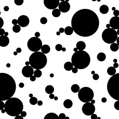 Black circles of different sizes on a white background. Seamless black and white pattern for wallpaper, fabric, wrapping paper