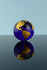 earth globe on blue background