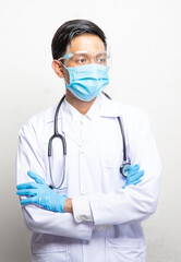 Doctor Man on blur hospital laboratory panoramic blue background. COVID-19 virus epidemic outbreak to Coronavirus pandemic disease global recession wide concept for social scientist vaccine