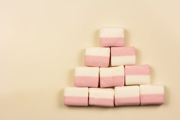 marshmallow on a pink background