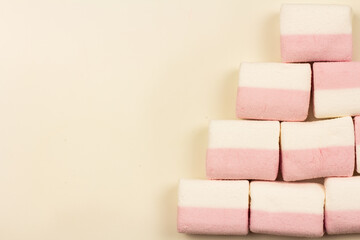 marshmallow on a pink background