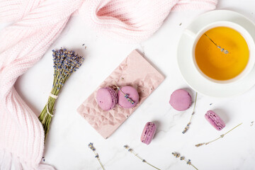 flat lay sweets, pink chocolate with lavender and macaroons