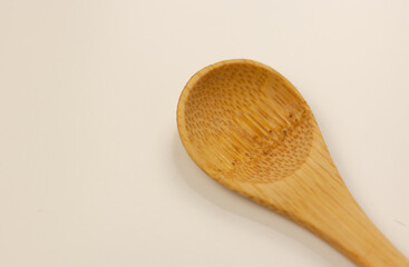 wooden spoon on a white background