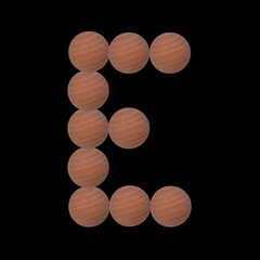 Letter of the alphabet made with circular wooden silhouettes. Isolated on black background