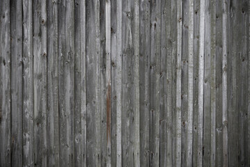 Old grey wooden boards background. Timber board. Grunge image. Board floor. Old rustic wooden texture.