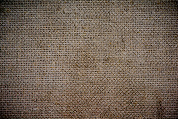 Grunge burlap sacking texture closeup photo background.