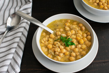 Greek Chickpea Soup With Lemon & Oregano (Revithosoupa): Bowls of Greek soup made with garbanzo beans, lemon, and oregano