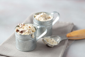 Fototapeta na wymiar vanilla and chocolate ice cream in aluminium cup