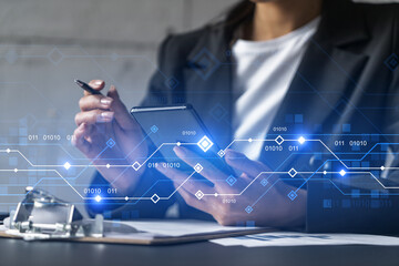 Businesswoman taking notes using smart-phone. Technology drawings double exposure.