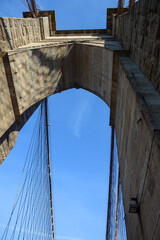 Fototapeta premium New York, NY, USA - June 3, 2019: Brooklyn Bridge connects Manhattan and Brooklyn