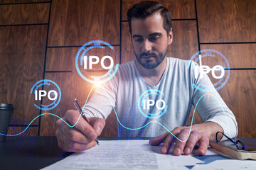 Handsome man working on IPO project. Multiexposure.