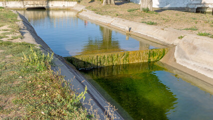 Agricultural canal or irrigation canal in a concrete wall Direct water to the farmer's farmland in arid areas of risky farming