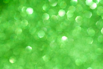 Fototapeta premium abstract green bokeh background from glitter
