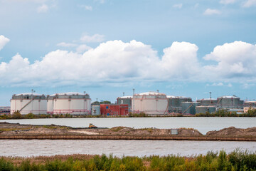 Fototapeta na wymiar Tank farm oil and gas terminal in Saint Petersburg, Business power and energy industrial tank storage