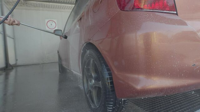 Eashing dirty car closeup footage