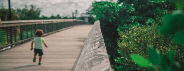 walking down the bridge of Baker park in Naples Florida in southwest Florida public park 