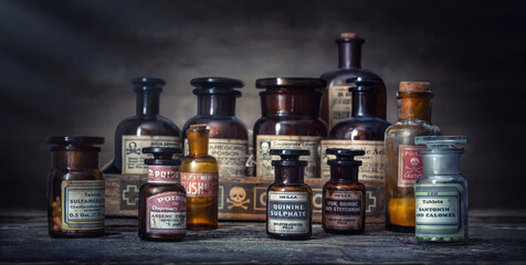 Bottles with drugs from old medical, chemical and pharmaceutical glass. Chemistry and pharmacy...