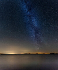 Fototapeta na wymiar Milky way over lake Saimaa