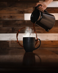 pouring coffee into cup