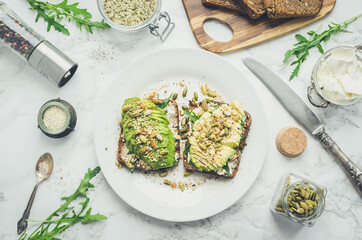 Healthy avocado toasts for breakfast or lunch