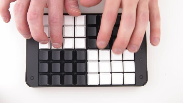 Hands typing fast on Unlabeled keyboard