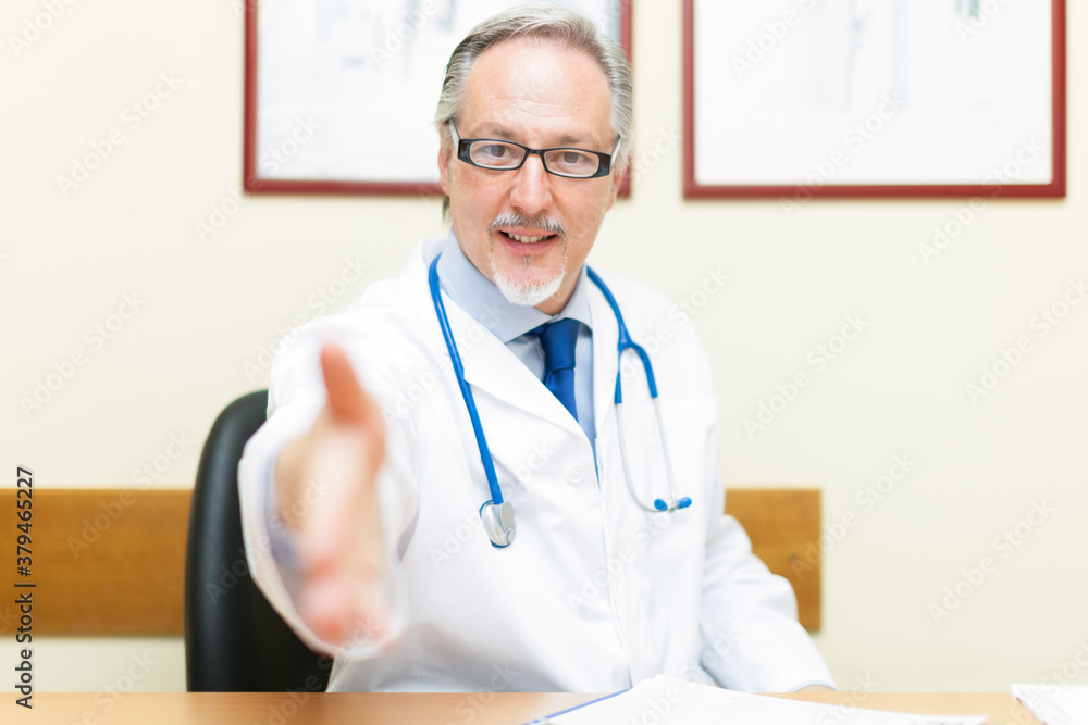 Canvas Prints doctor welcoming a patient in his studio, handshake