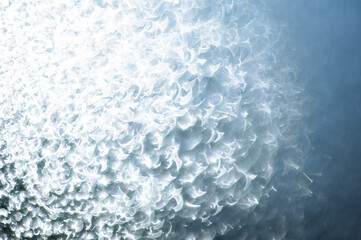 Obraz premium Abstract blurred glow bokeh background with glitter lights.