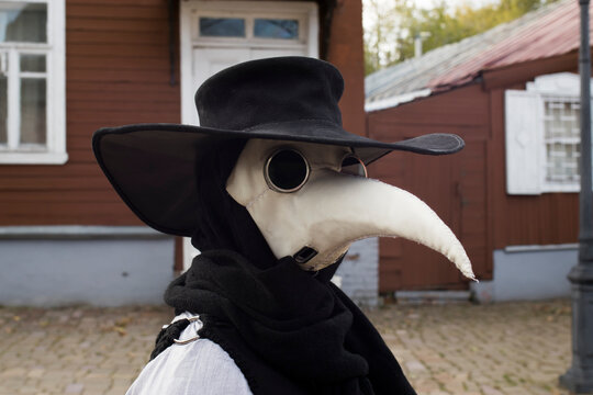 Modern stylized plague doctor in leather mask
