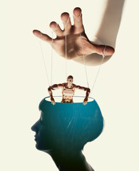 Marionette in human head. Concept of mind control. Image