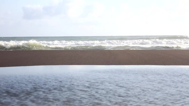 river sand waves become one on Samas beach in Yogyakarta