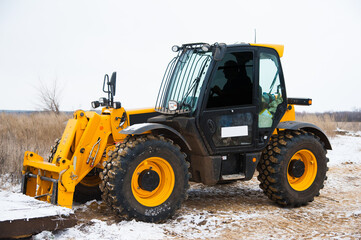 Farm loader at work