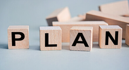 PLAN - the inscription on wooden cubes on a white background