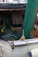 Obraz premium stern of an Italian fishing boat with nets ready for fishing