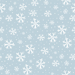 Winter Christmas seamless hand drawn vector pattern with snowflakes.