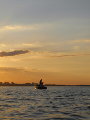 fishing boat at sunset