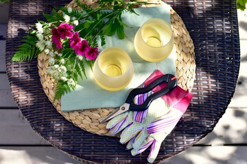 Warm sunny afternoon with relaxing glasses of wine to enjoy after a day of yard and garden...