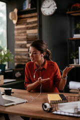 Businesswoman is having a video call on laptop..