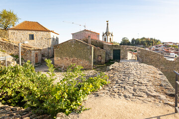 Fototapeta na wymiar a street with old houses at the historical center of Pinhel city, Guarda district, Beira Alta province, Portugal