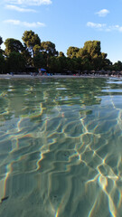 Underwater photo of famous paradise beach of Koukounaries, Skiathos island, Sporades, Greece