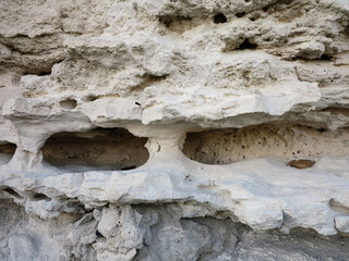 Naklejka premium Stones texture and background. Erosion creates amazing textures and patterns. Stone texture, rock texture and background. Rock surface.