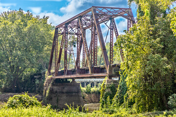 Old, historic Jefferson railway bridge in Jefferson, Texas USA